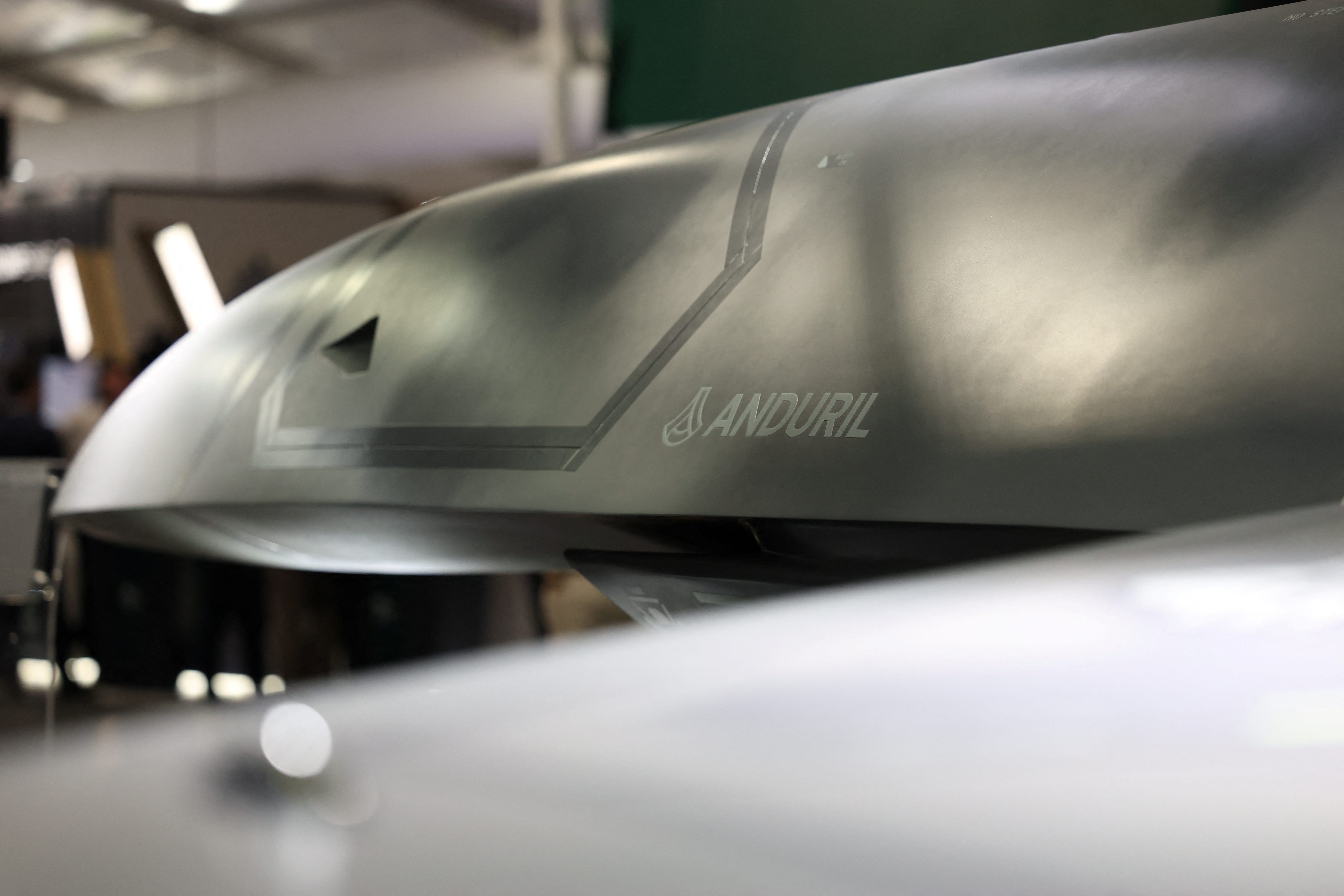 A close-up of the Anduril logo on its Fury autonomous fighter jet.