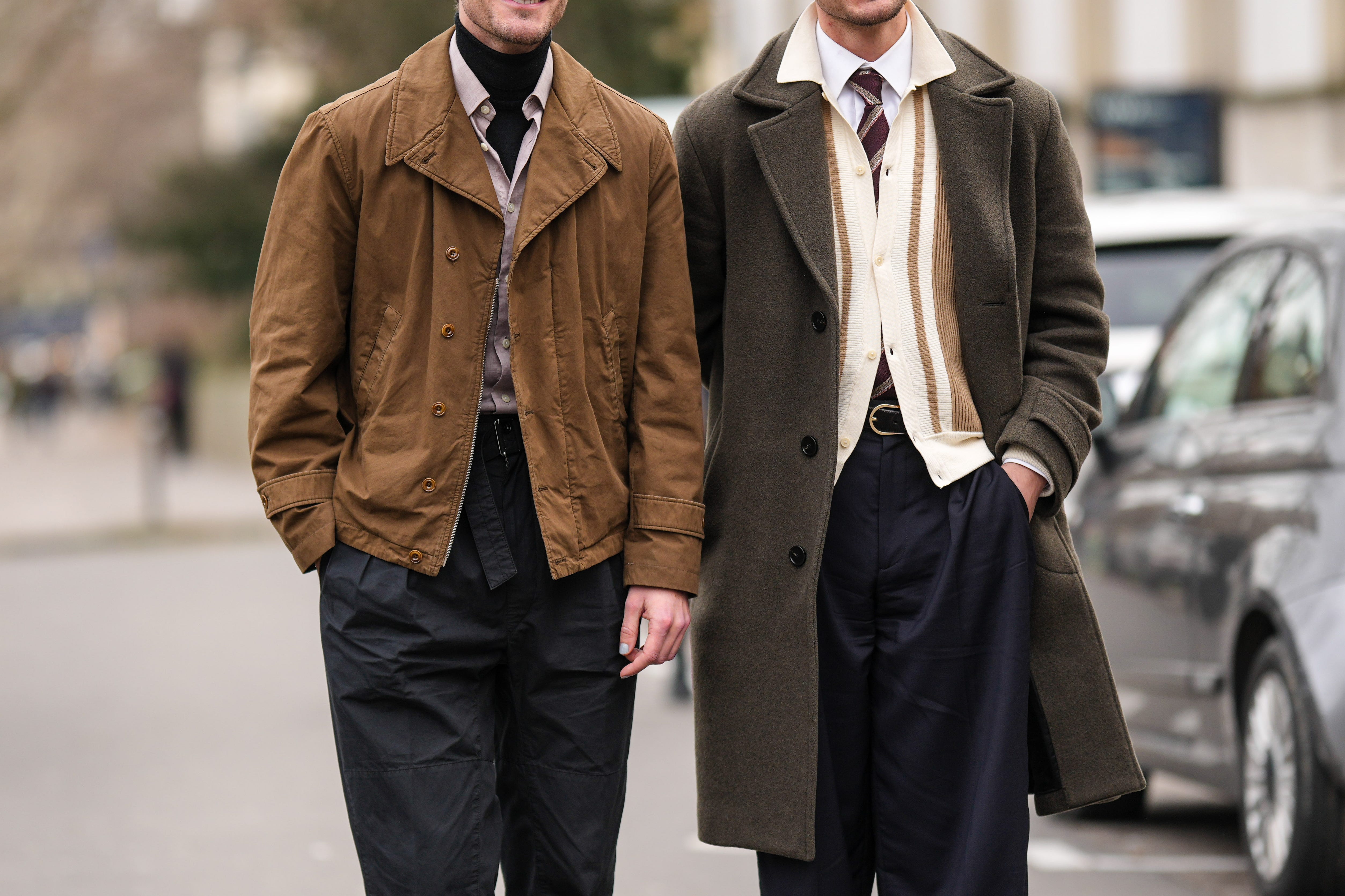 Men wearing neutral colored jackets