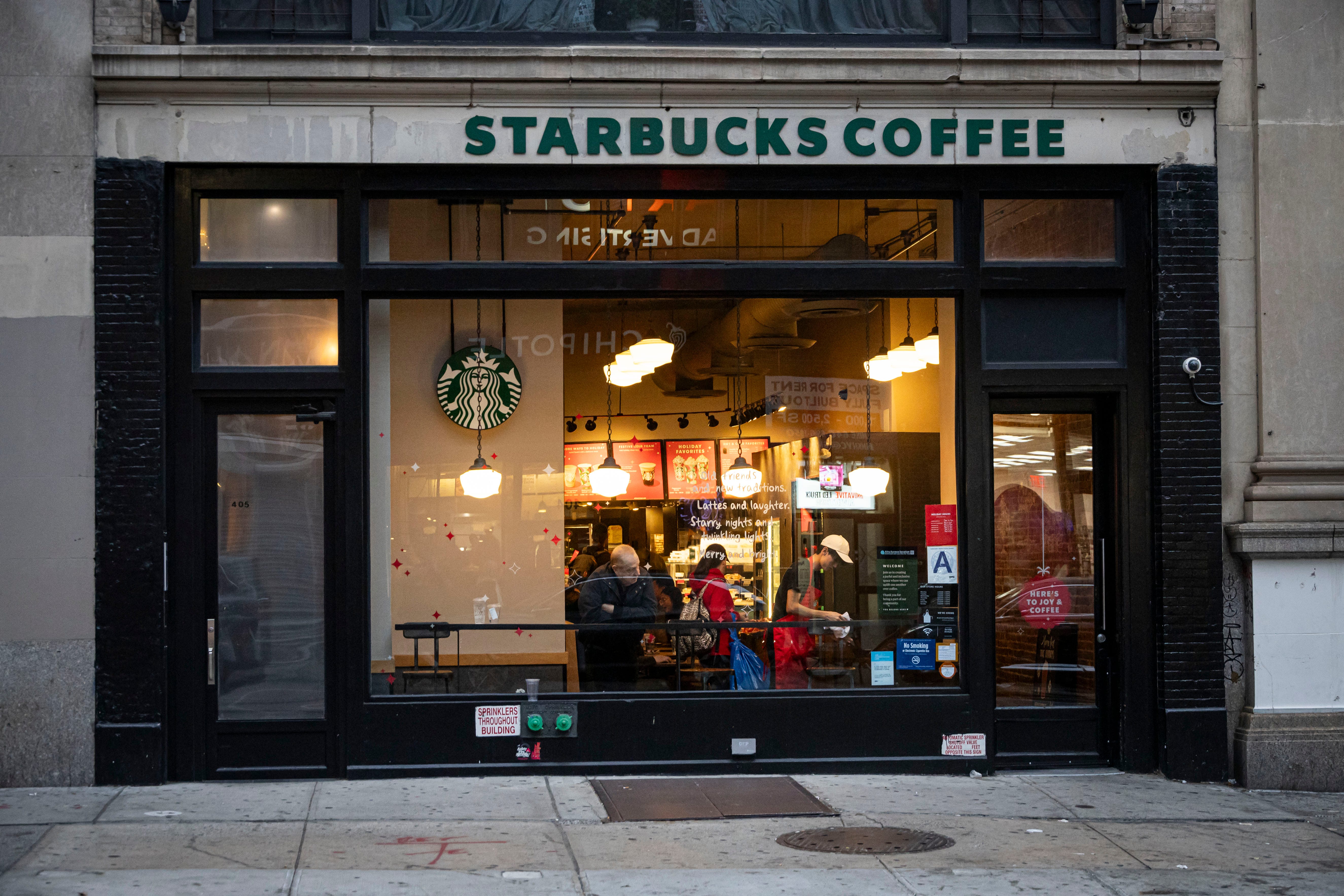 Starbucks Coffee location in New York City from the outside.