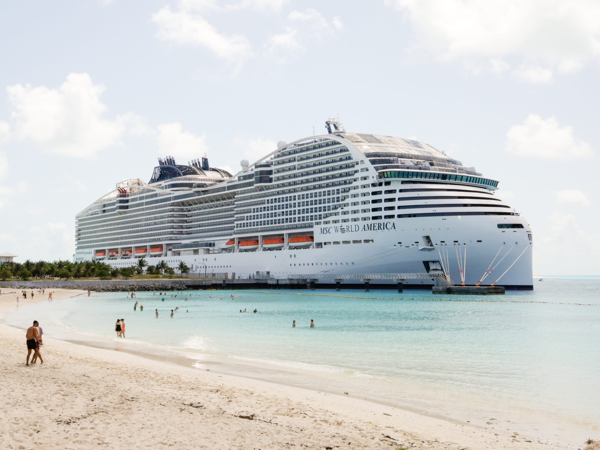 MSC World America docked near MSC Ocean Cay Marine Reserve's beach