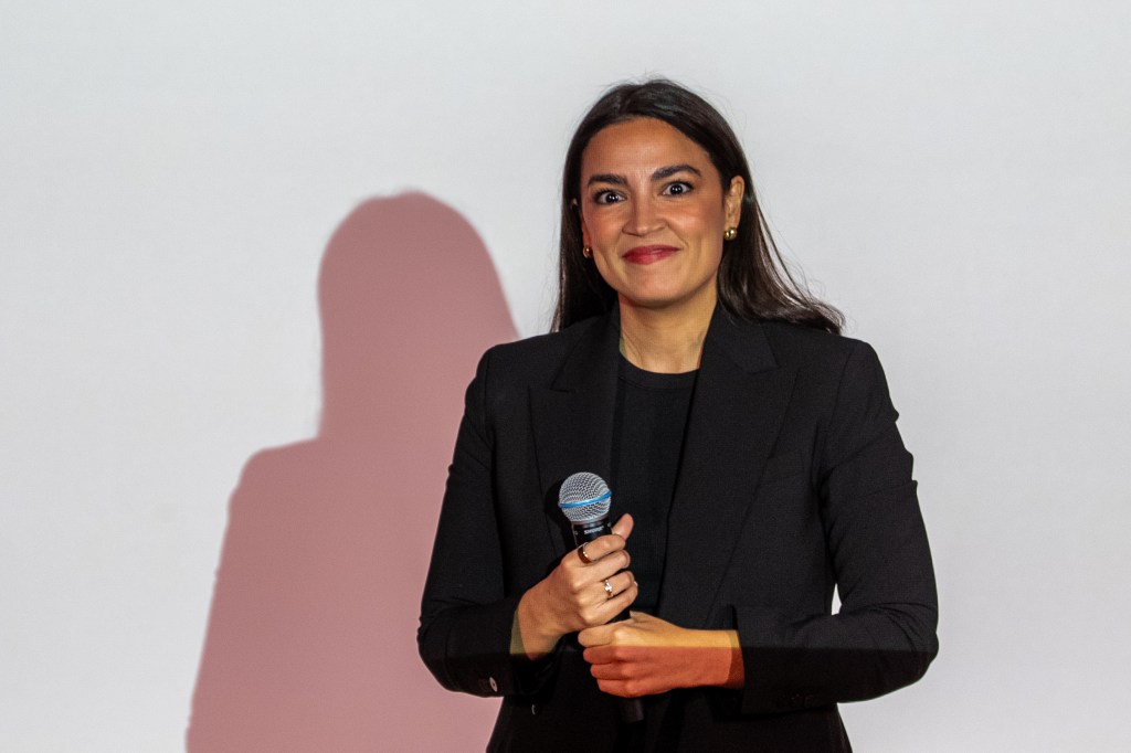 Rep. Alexandria Ocasio-Cortez (D-NY) departs from a town hall gathering on May 2, 2025 in New York City.