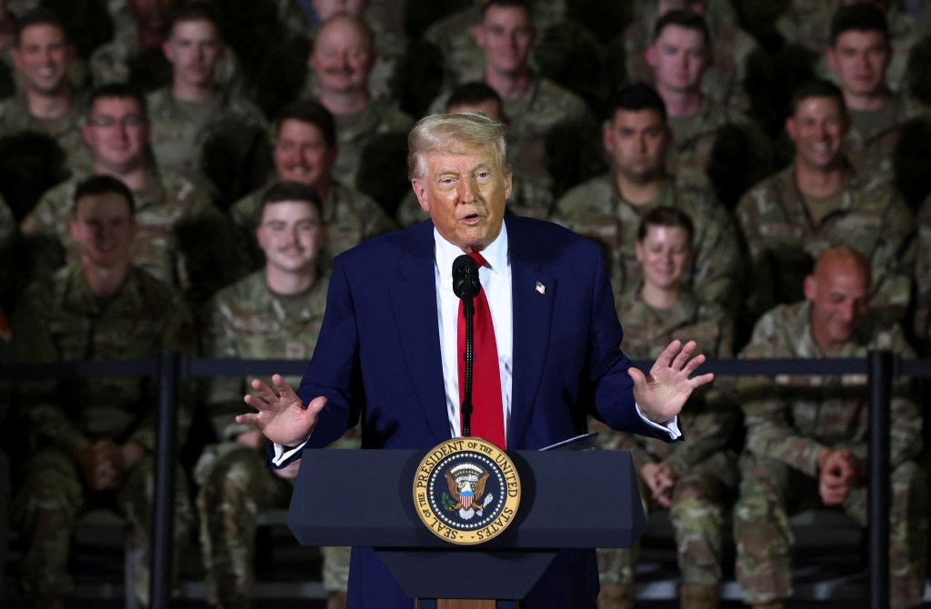 President Donald Trump speaks during an event at Selfridge Air National Guard Base as he celebrates his first 100 days in office, in Harrison Township, Michigan, U.S., April 29, 2025.