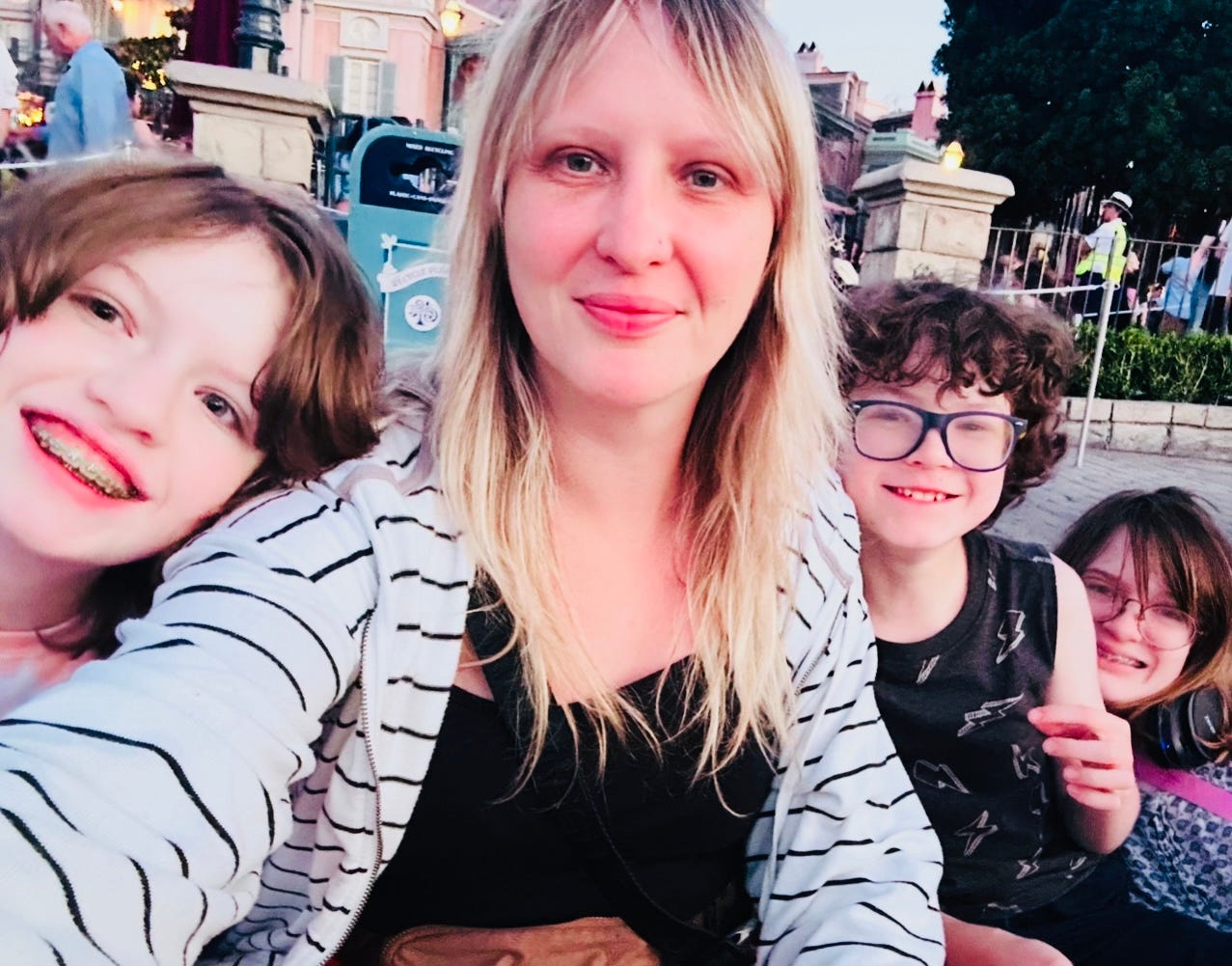 mom with kids at Disney