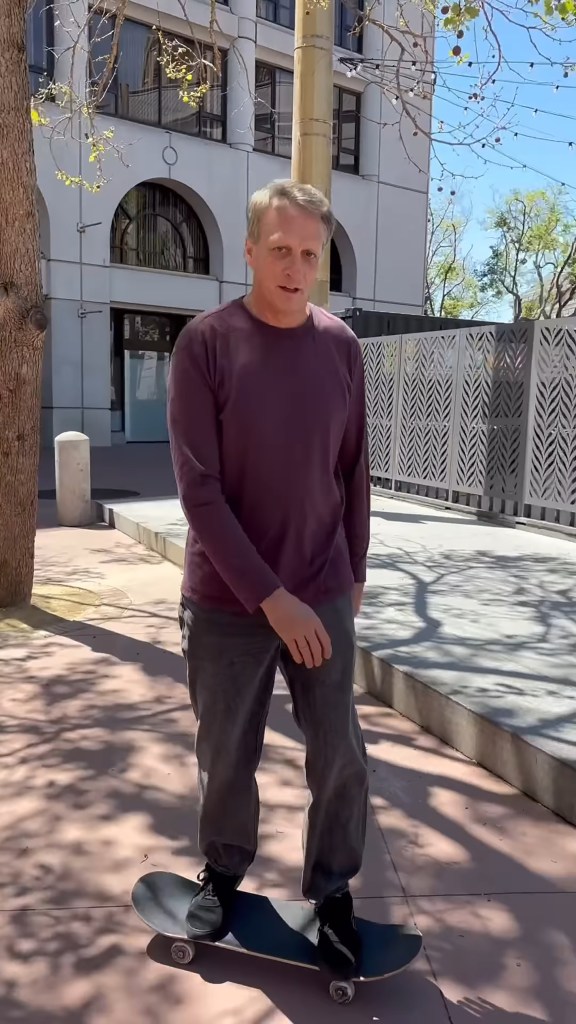 A photo shows Tony Hawk on his board at the U.N. Skate Plaza.