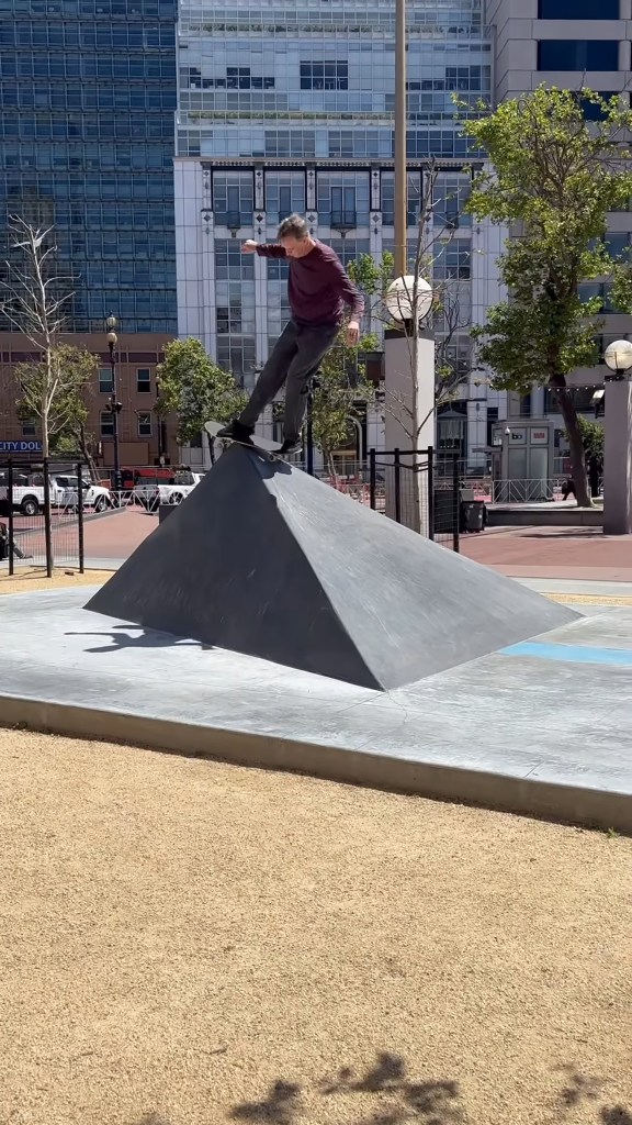 A photo shows Hawk doing a trick in San Francisco.