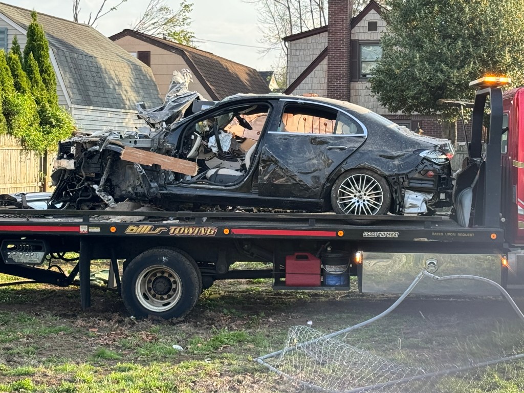 Vehicle into a house in Hicksville.