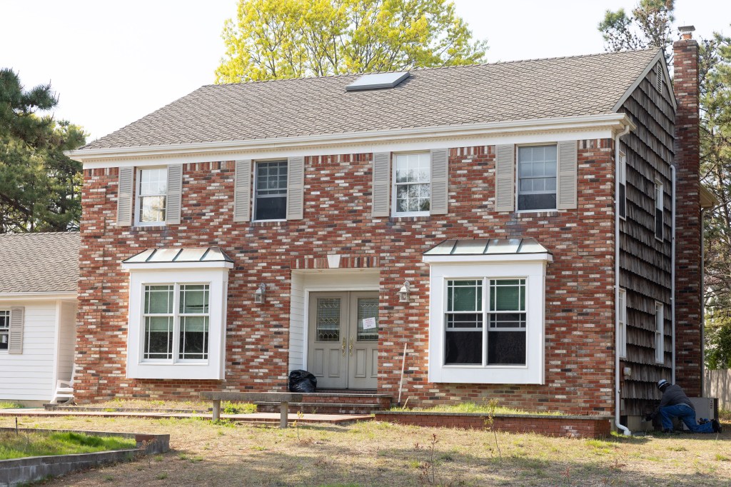 Authorities responded to a home with a strong ammonia stench and found about 100 dead cats inside. 