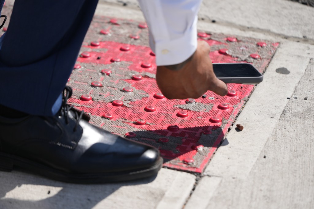 A 60-year-old woman was struck by a stray bullet in Harlem on Saturday afternoon.