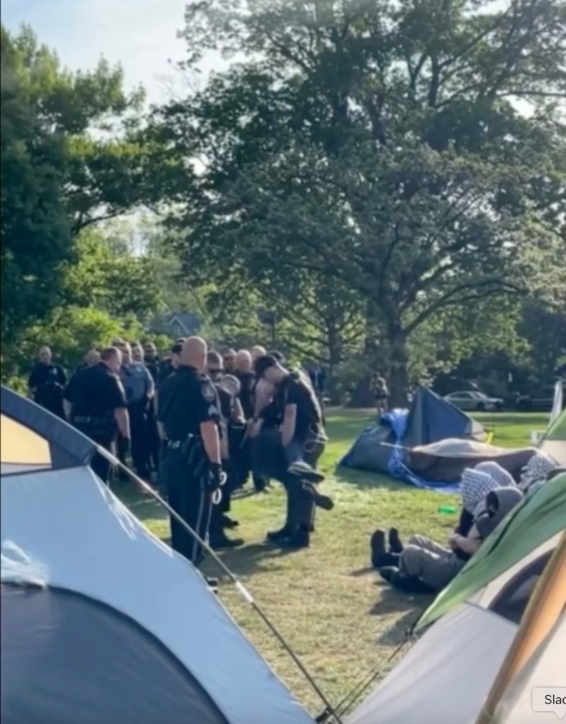 Protestors being carried out by police
