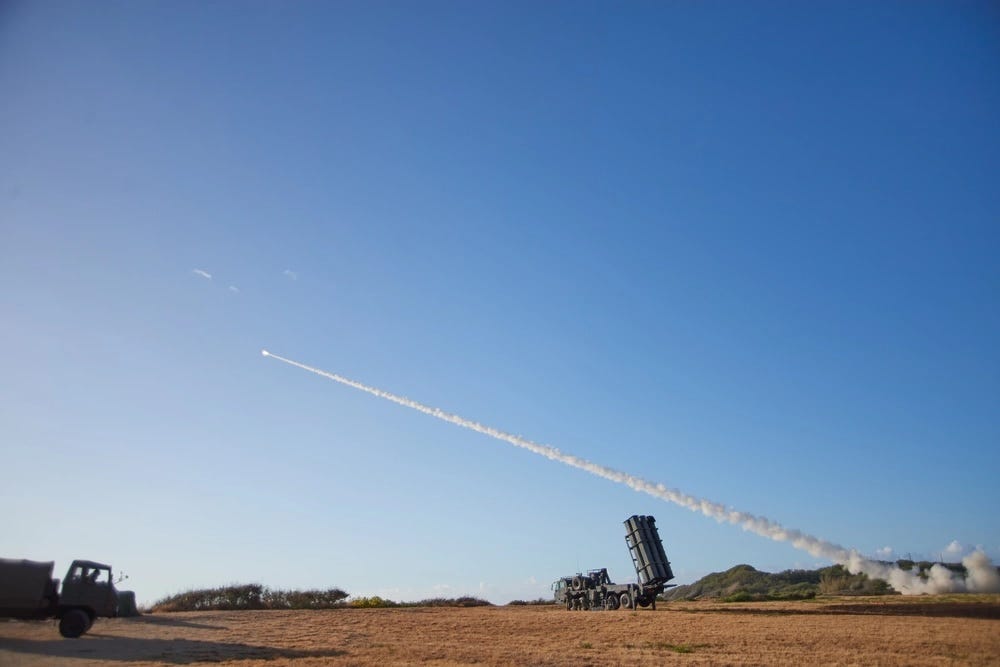 A NMESIS weapon system launches a missile as part of a sinking exercise.