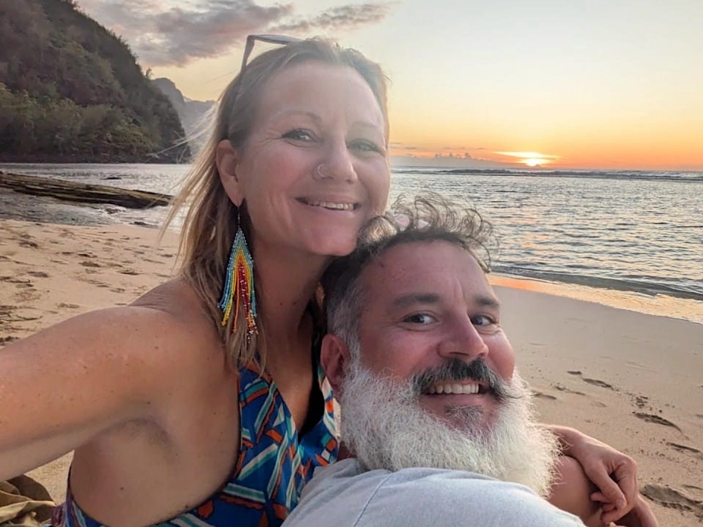 The author and her husband on a beach in Hawaii.