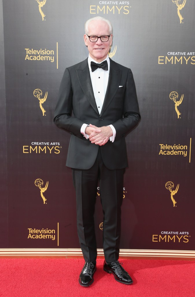 Tim Gunn in a suit on the red carpet at the Met Gala. 
