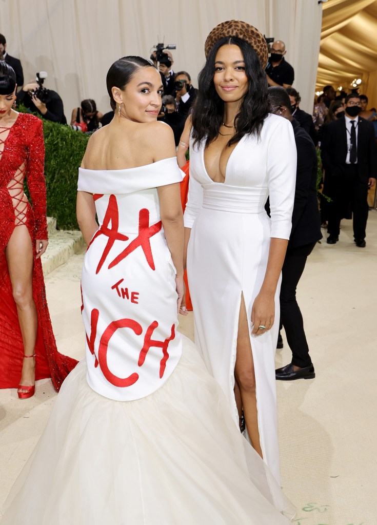 AOC at the Met Gala wearing a Tax The Rich dress.