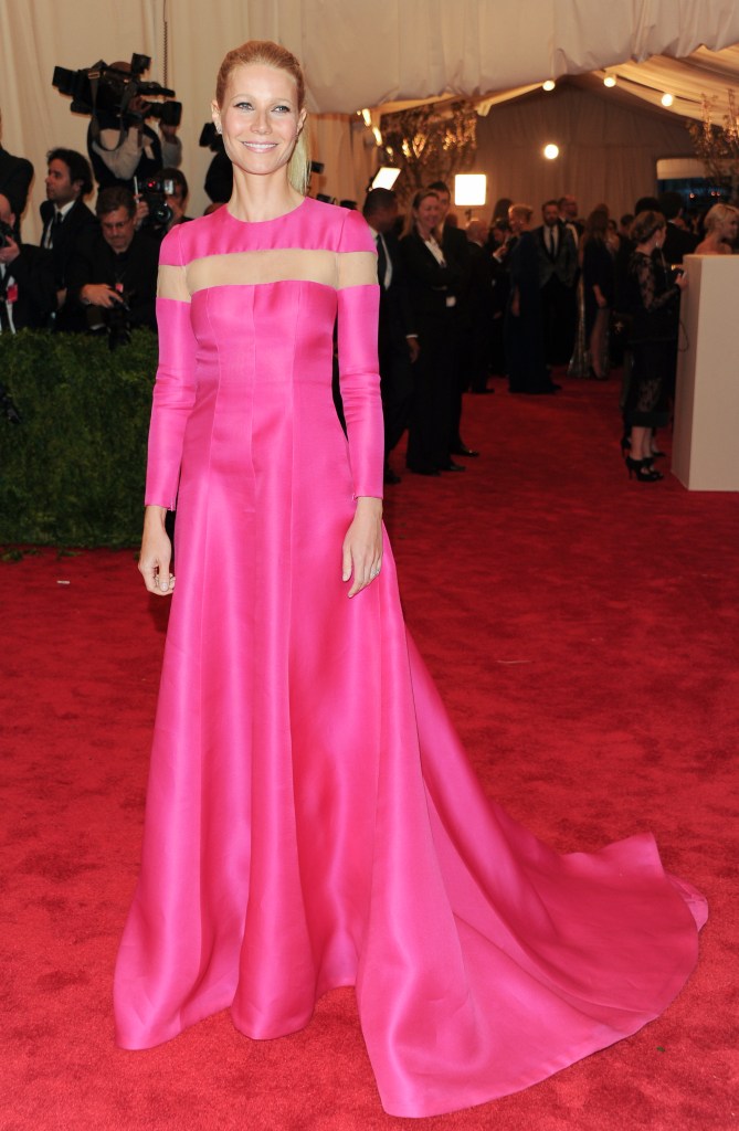 Gwyneth Paltrow in pink dress on Met Gala red carpet.