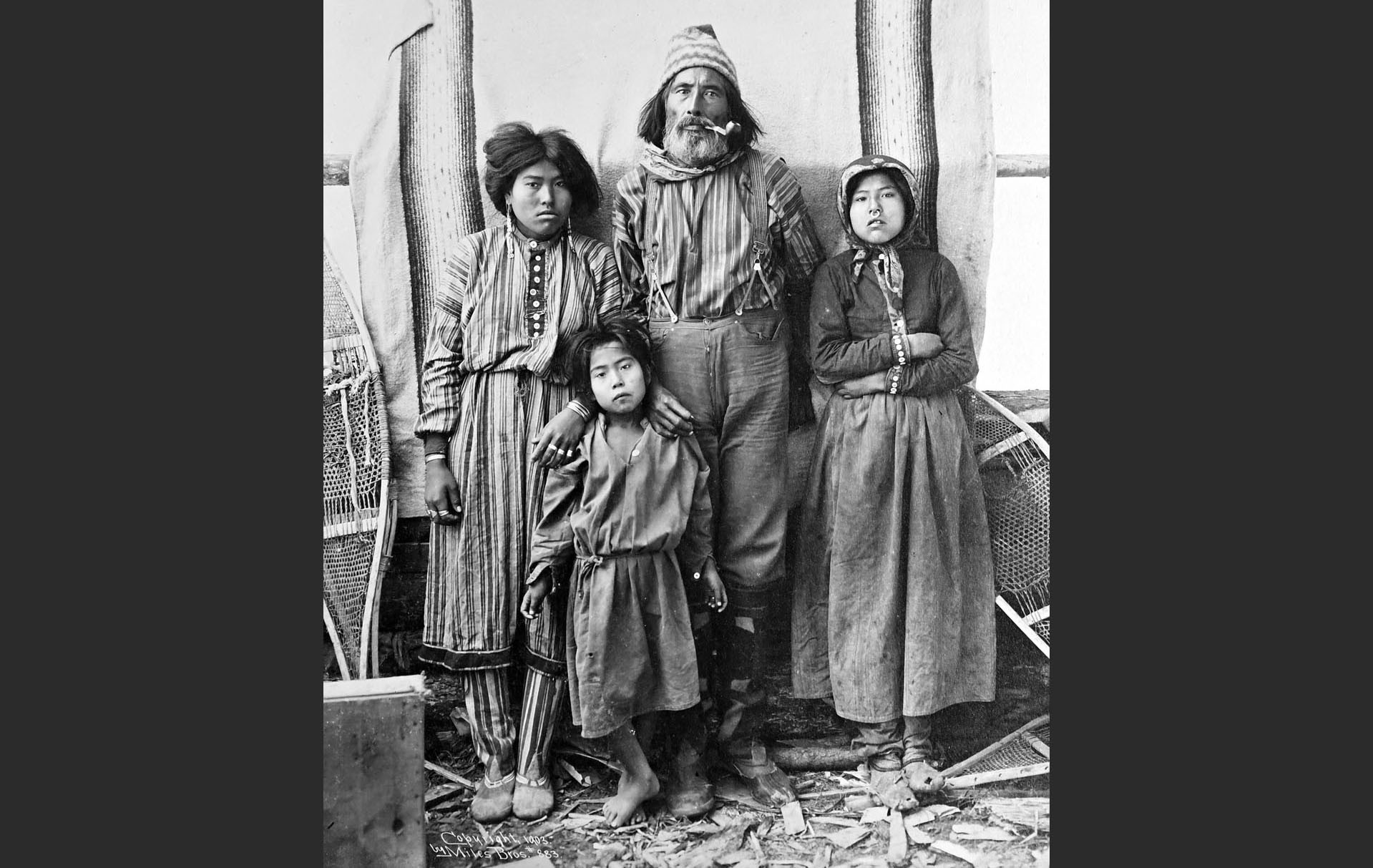 A family of Alaska Natives poses for a photo.