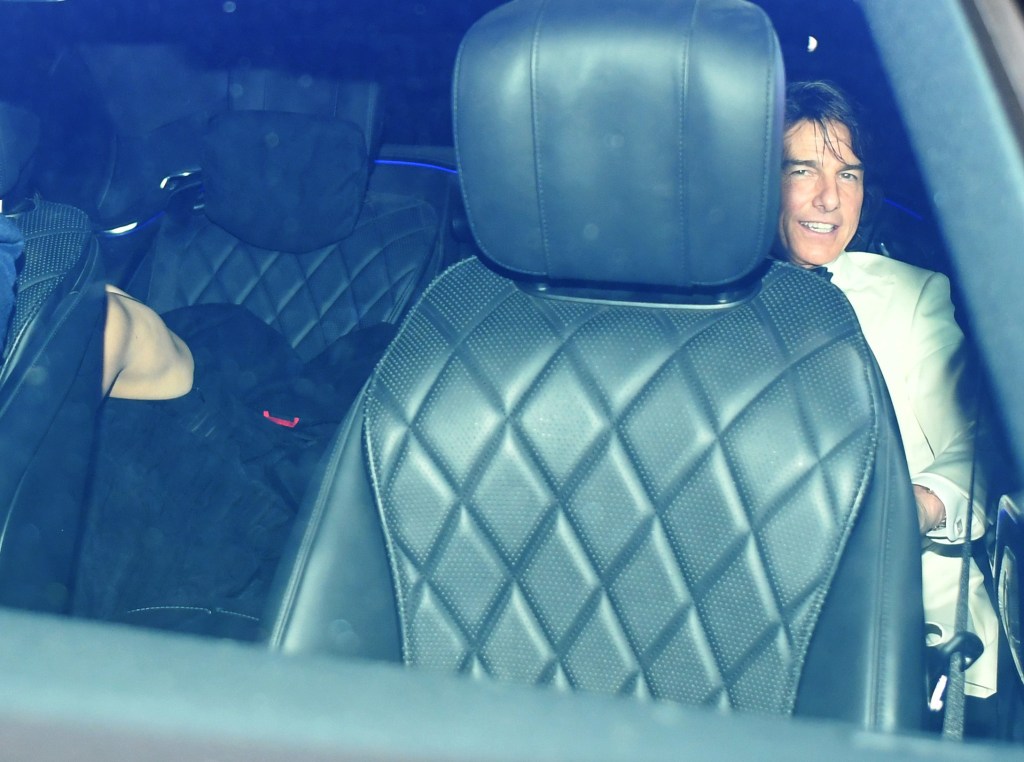 Tom Cruise and Ana De Armas seen trying their best to hide as they are seen arriving and leaving David Beckham 50th Birthday Party 