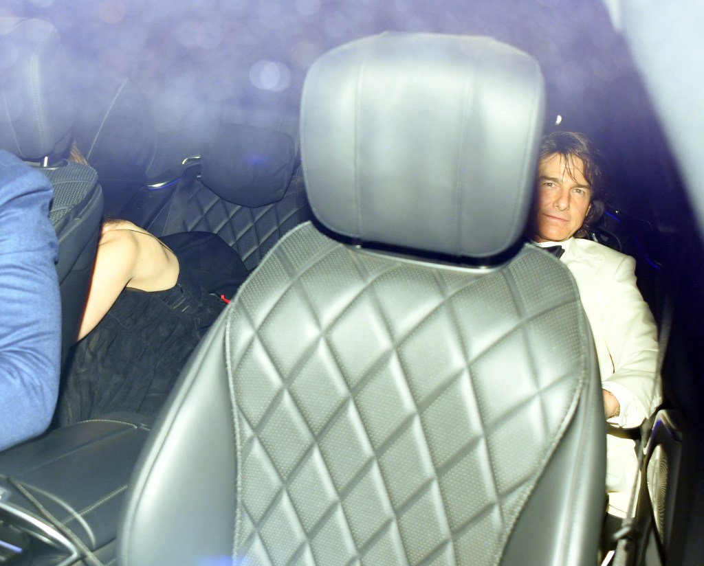 Tom Cruise and Ana De Armas seen trying their best to hide as they are seen arriving and leaving David Beckham 50th Birthday Party Together.