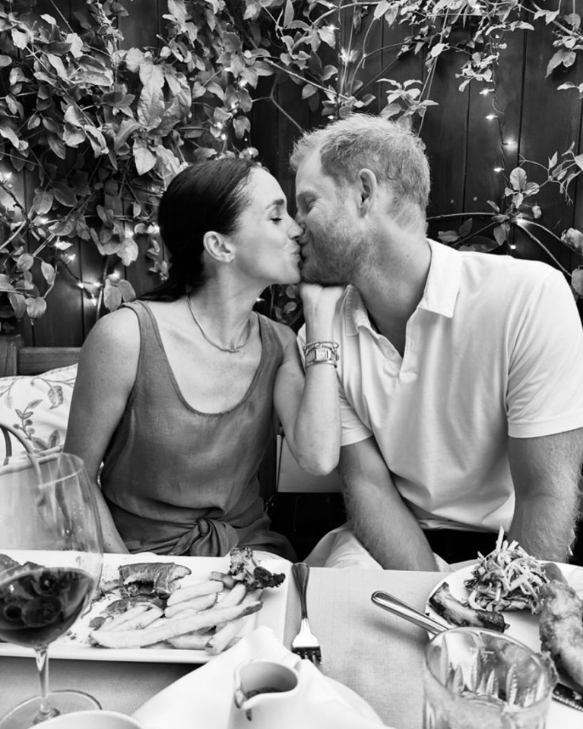 Meghan Markle and Prince Harry kissing