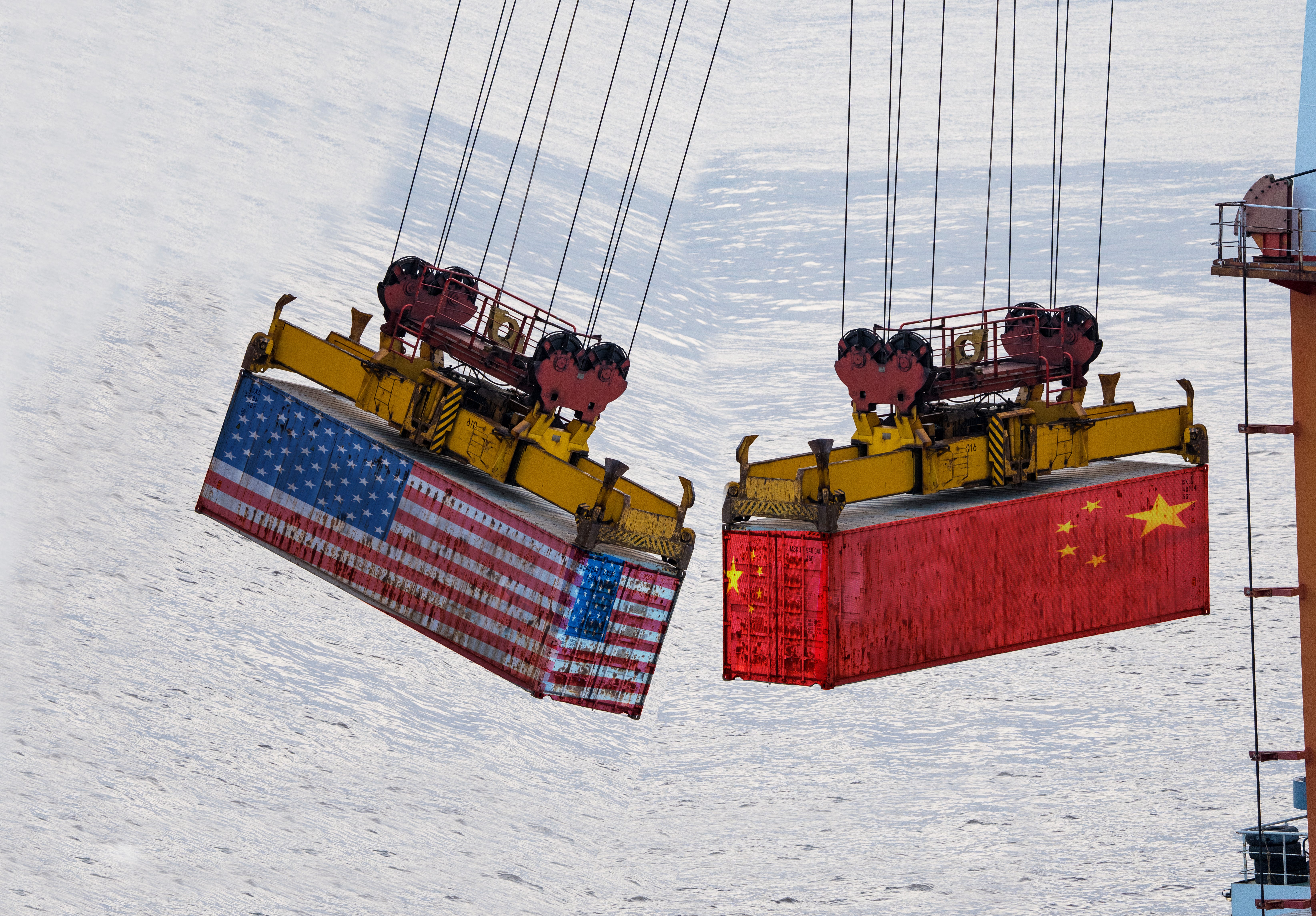 Cargo containers with the US and China flags