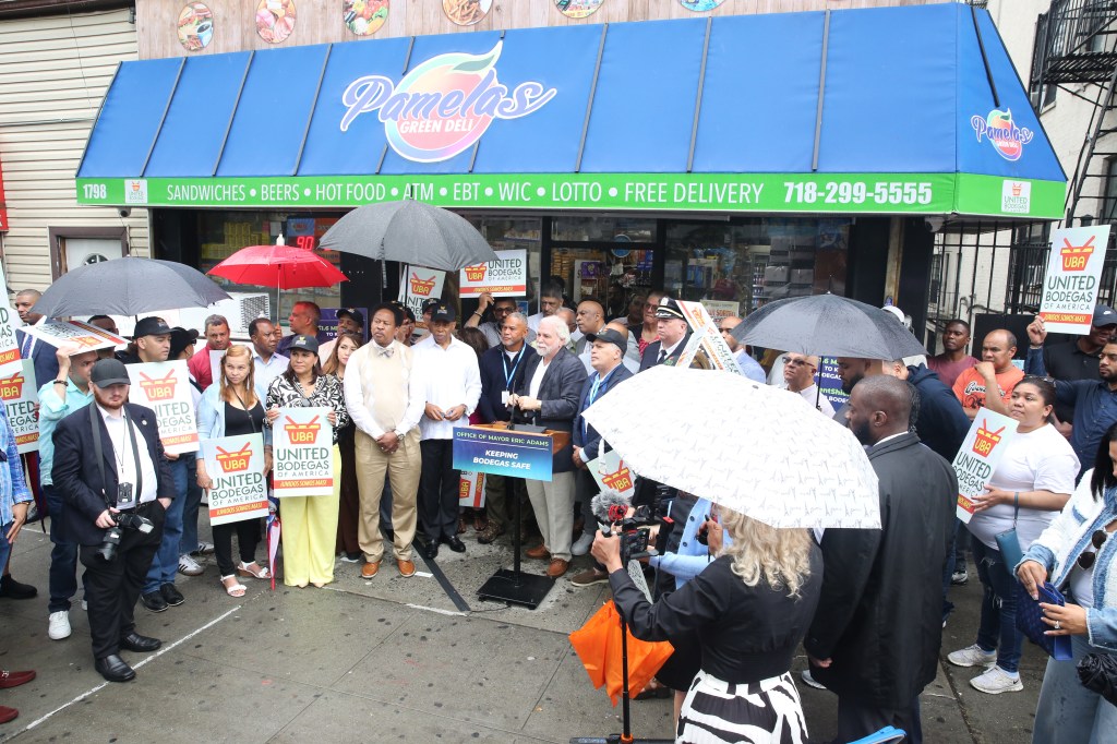 Press conference outside Pamela's Green Deli. 