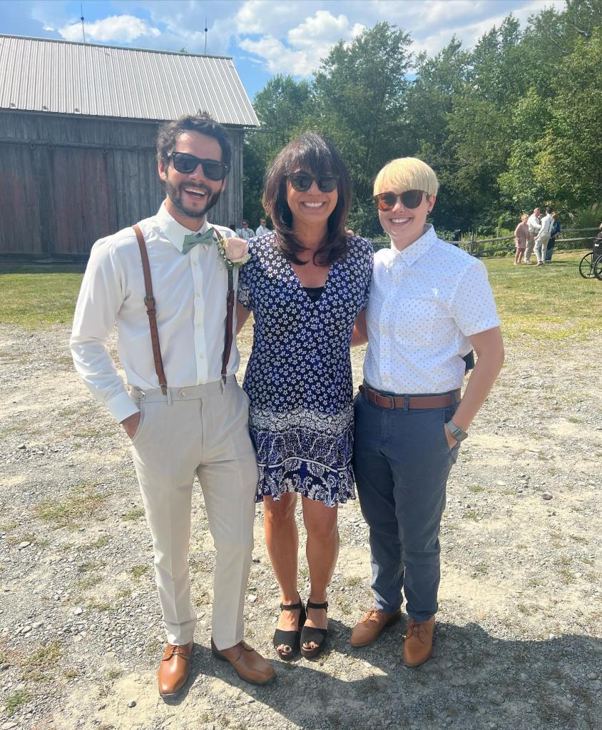 Dylan O'Brien and Julz O'Brien with their mom in 2023. 