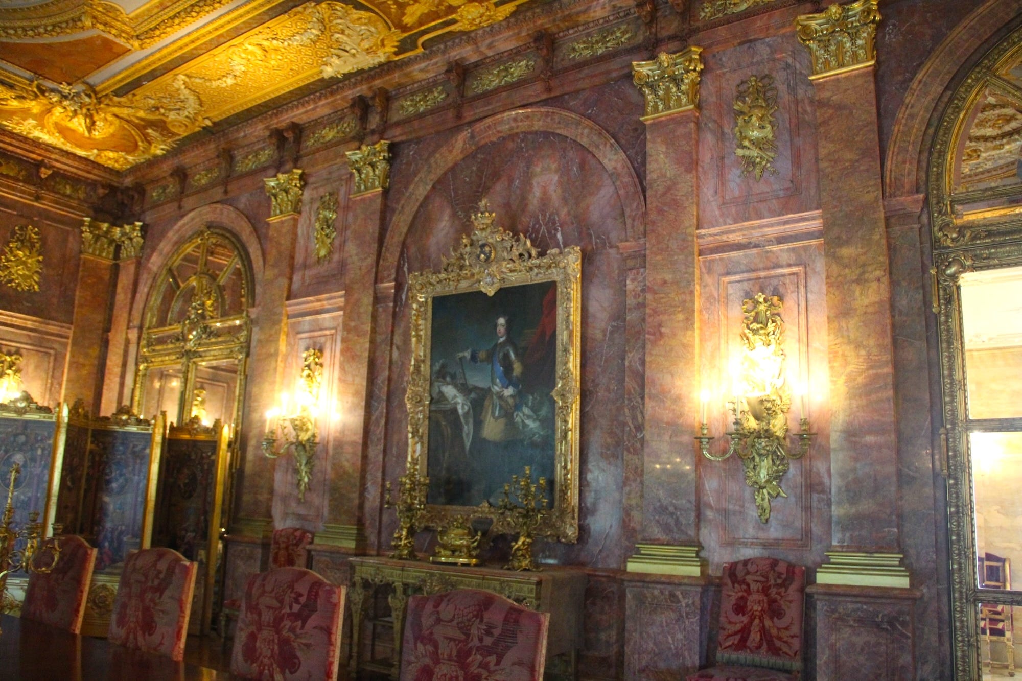 The purple marble walls of the Dining Room at Marble House