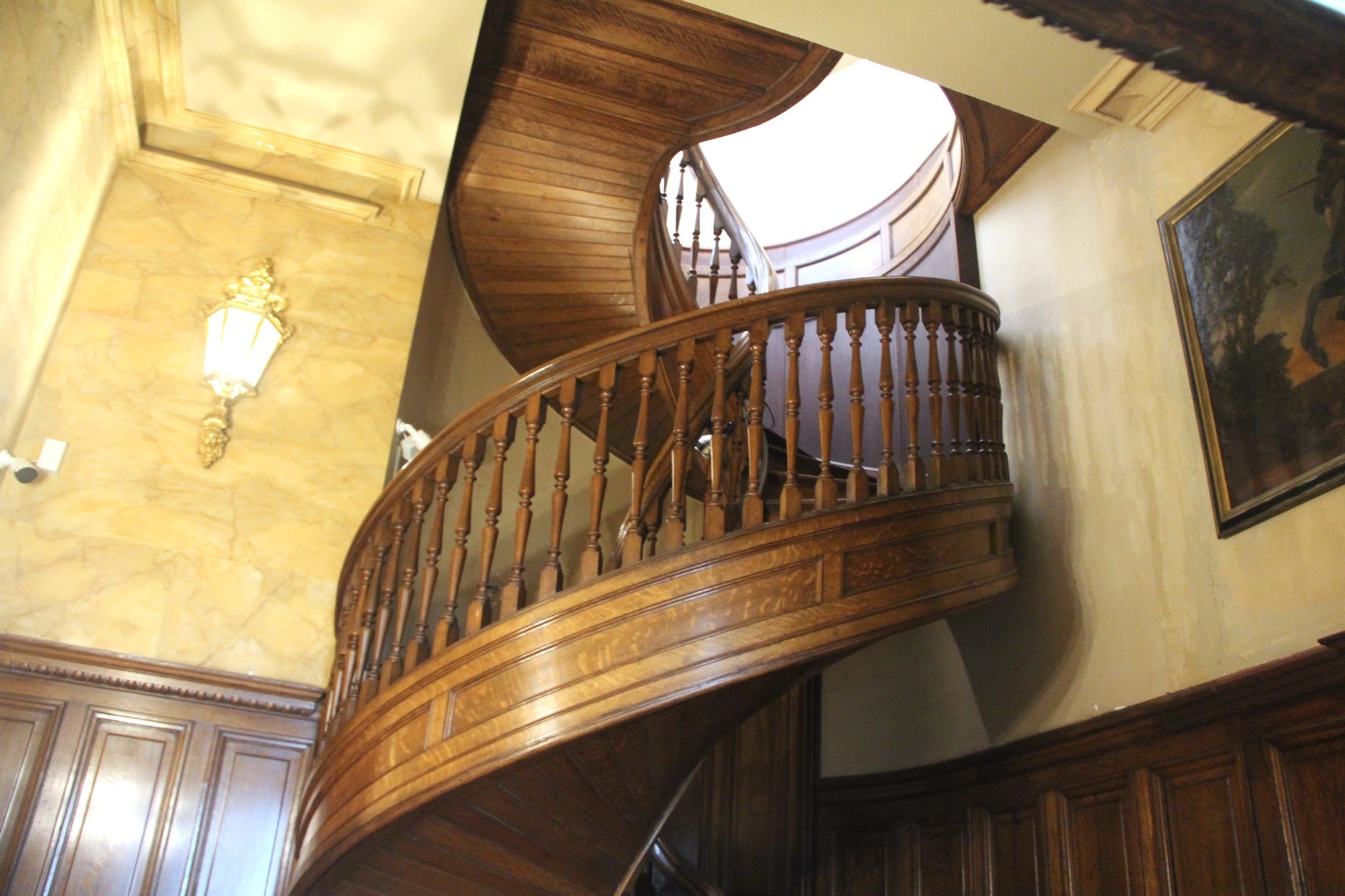 The servant staircase at Marble House, a wooden spiral staircase.