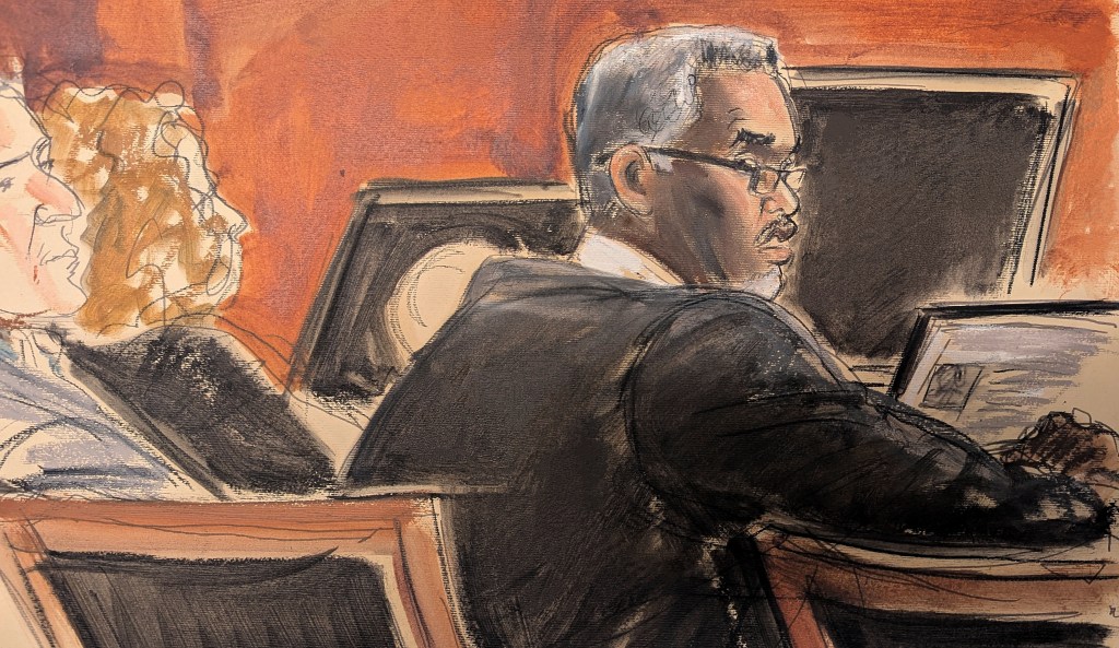 Sean 'Diddy' Combs sitting at the defense table in Manhattan federal court, observing prospective jurors