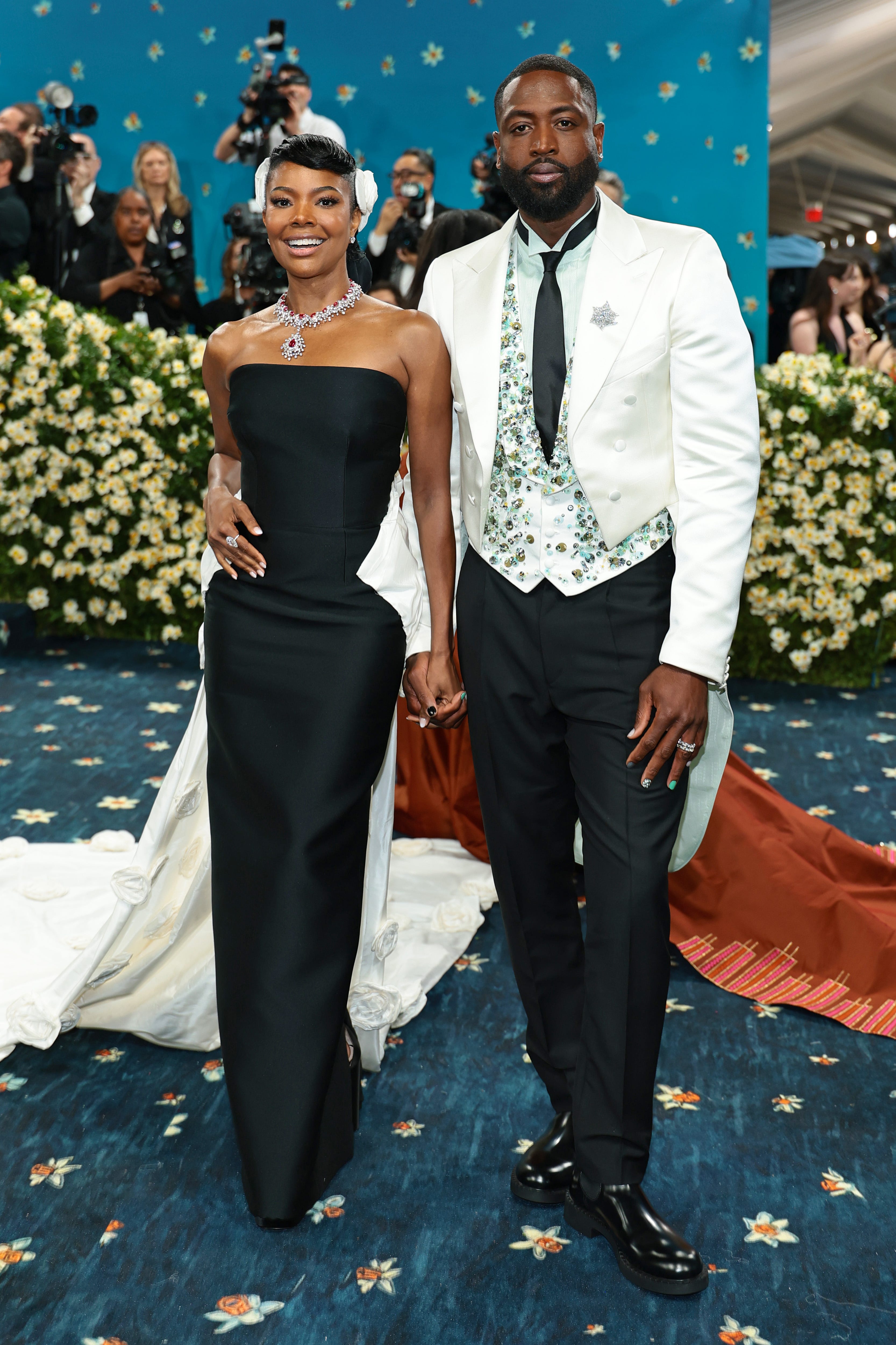 Gabrielle Union Wade and Dwyane Wade attend the 2025 Met Gala