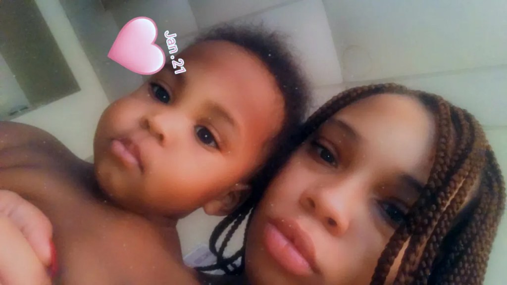 Nytavia Ragsdale holding her son Jahmeik Modlin, implicated in a case related to child's negligent death