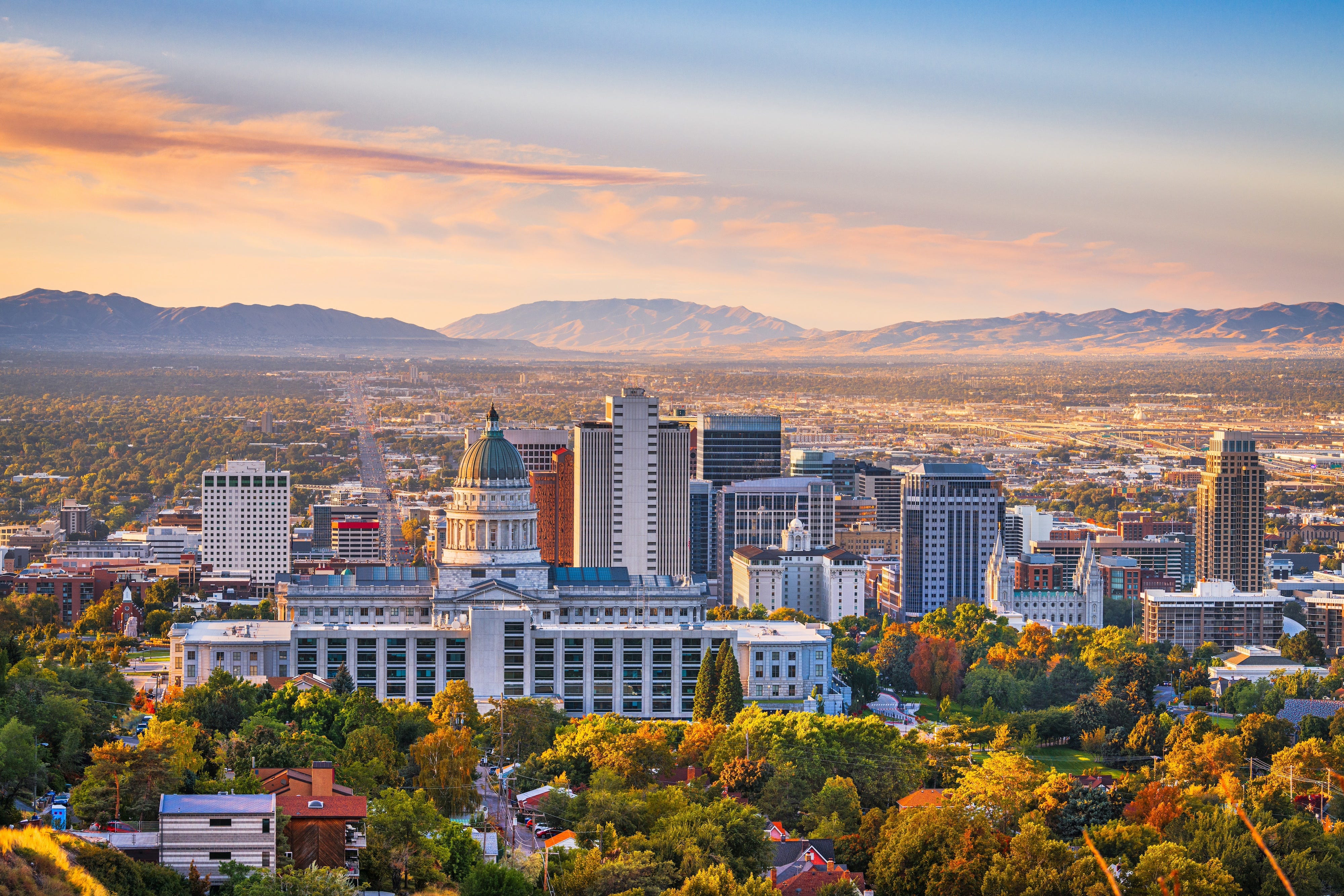 A view of the Salt Lake City skyline at dawn. The capitol is in the frame.