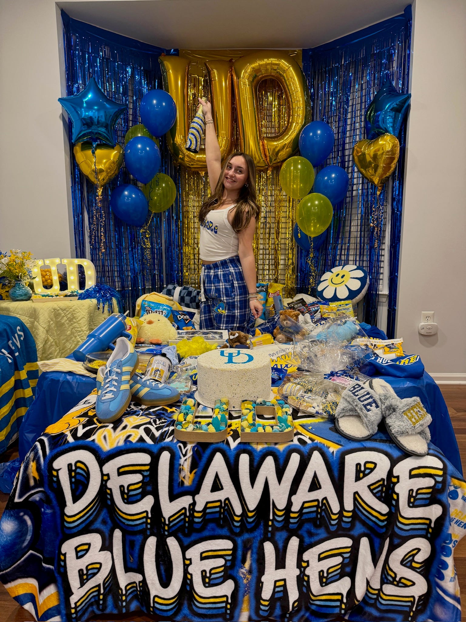 Dina Genek posing at her University of Delaware bed party.