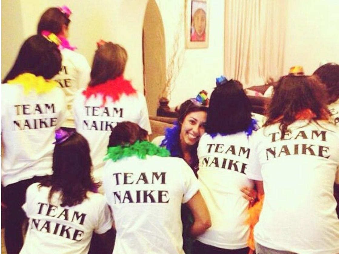 Naiké Vorbe and her family wearing "TEAM NAIKE" shirts