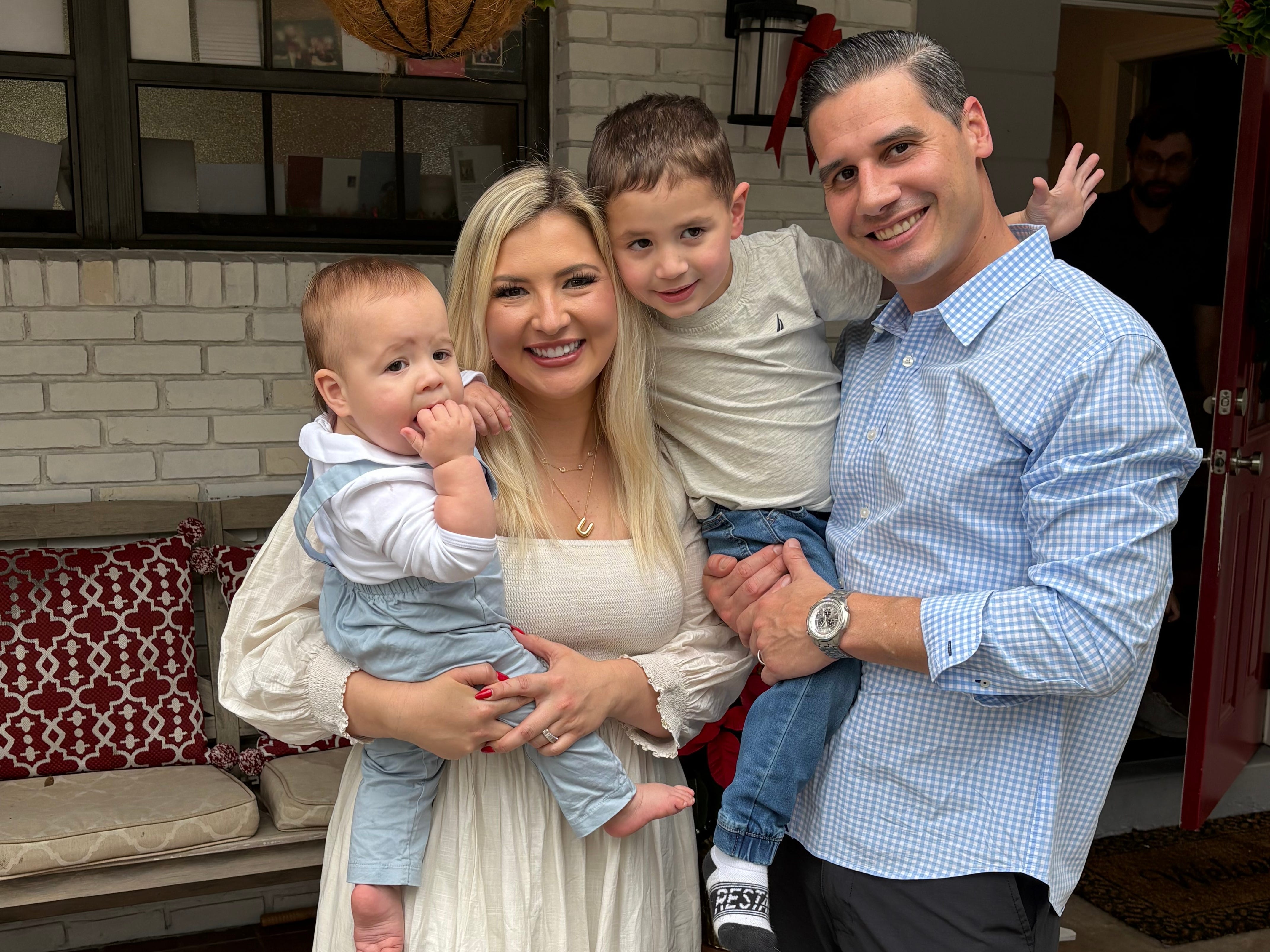Ultima Espino with her husband and two kids.