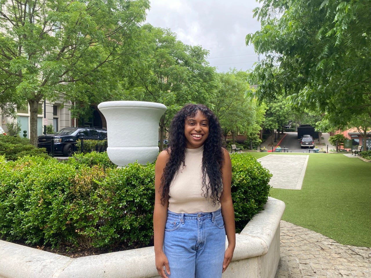 Author Amaris Ramey smiling in garden