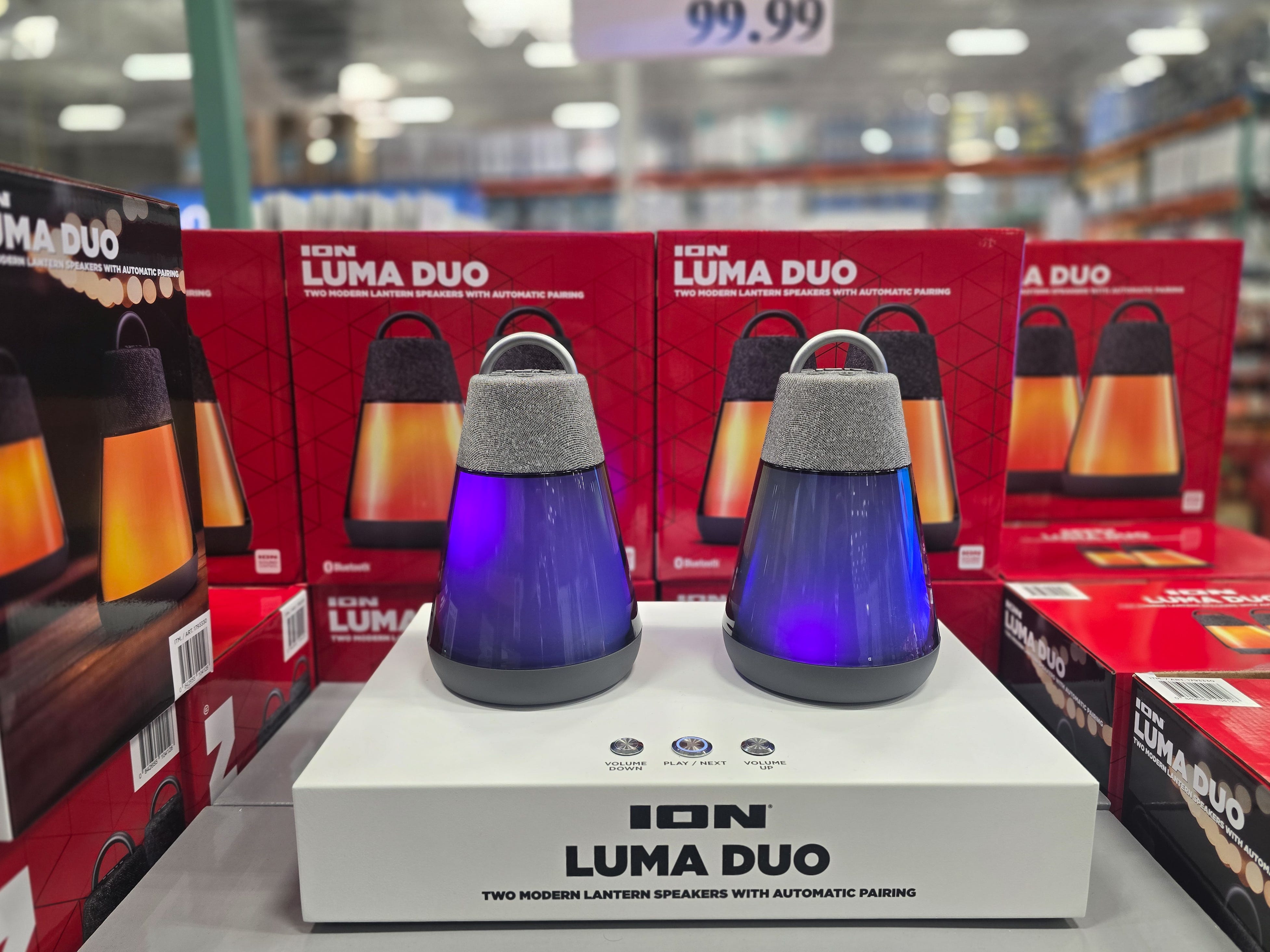 Two purple lantern speakers on top of a box that reads "Ion Luma Duo."