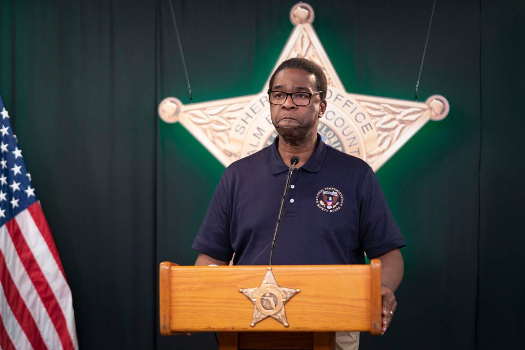 NTSB Board member Alvin Brown speaks at a press conference about the crash near Belle Glade that killed 9 people.