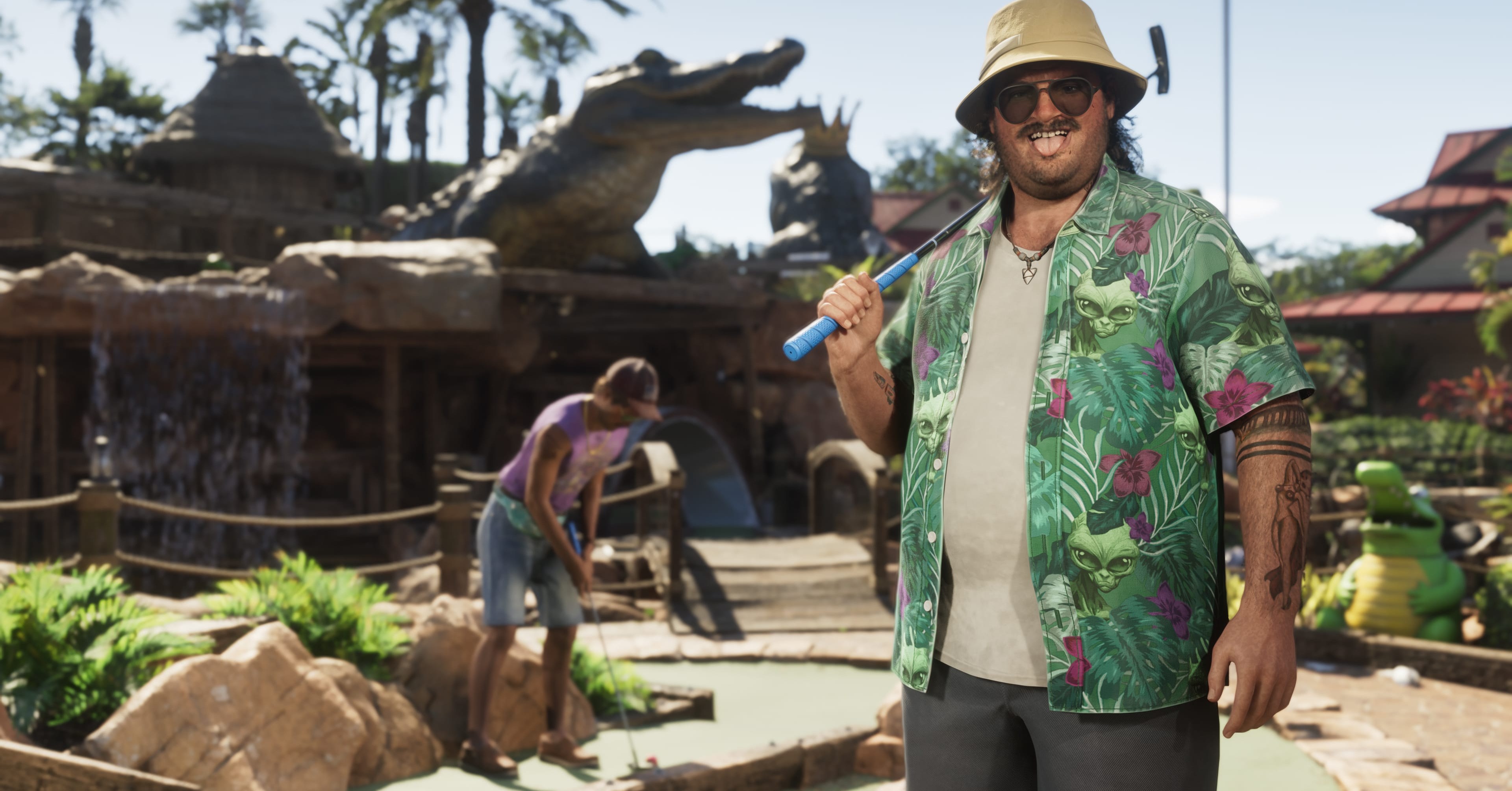 Cal Hampton holds a golf club at regular sized golf in GTA 6 (just kidding, this is a mini golf course)