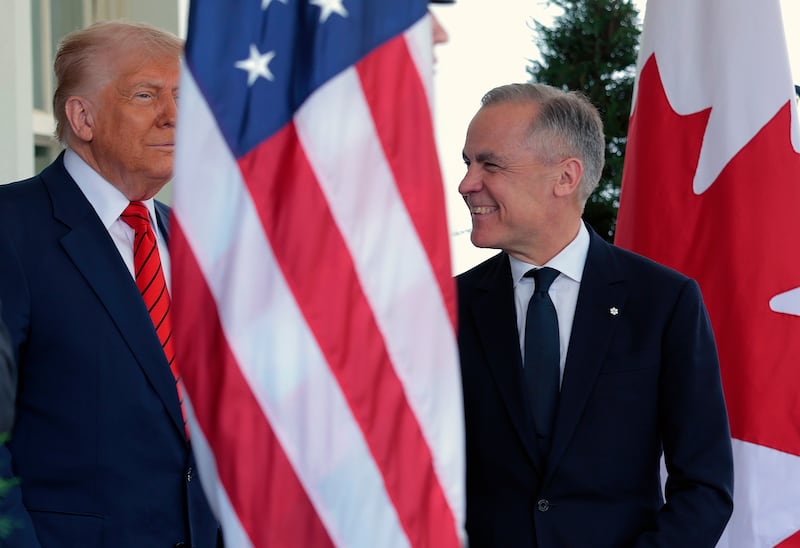 President Donald Trump greets Canadian Prime Minister Mark Carney as he arrives at the West Wing of the White House on May 6, 2025 in Washington, DC. Carney, who was elected into office last week, is expected to meet with President Trump to discuss trade and the recent tariffs imposed on Canada.