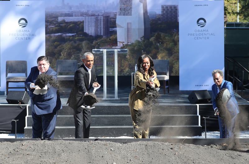 Officially breaking ground for the Obama Presidential Center are, from left, Illinois Gov. J.B. Pritzker, former President Barack Obama, former first lady Michelle Obama and Chicago Mayor Lori Lightfoot in Chicago's Jackson Park on Sept. 28, 2021. (Terrence Antonio James/Chicago Tribune/Tribune News Service via Getty Images)