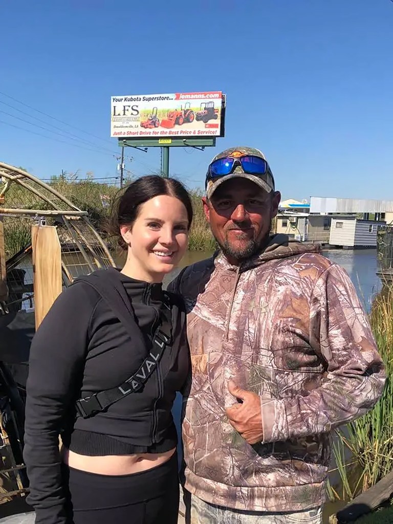 Del Rey getting a photo with husband Jeremy Dufrene