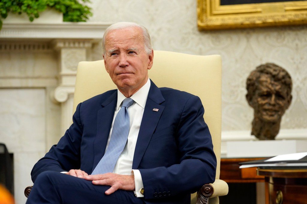 Then-President Joe Biden sits in the Oval Office of the White House during a meeting with Costa Rica President Rodrigo Chaves on Aug. 29, 2023.
