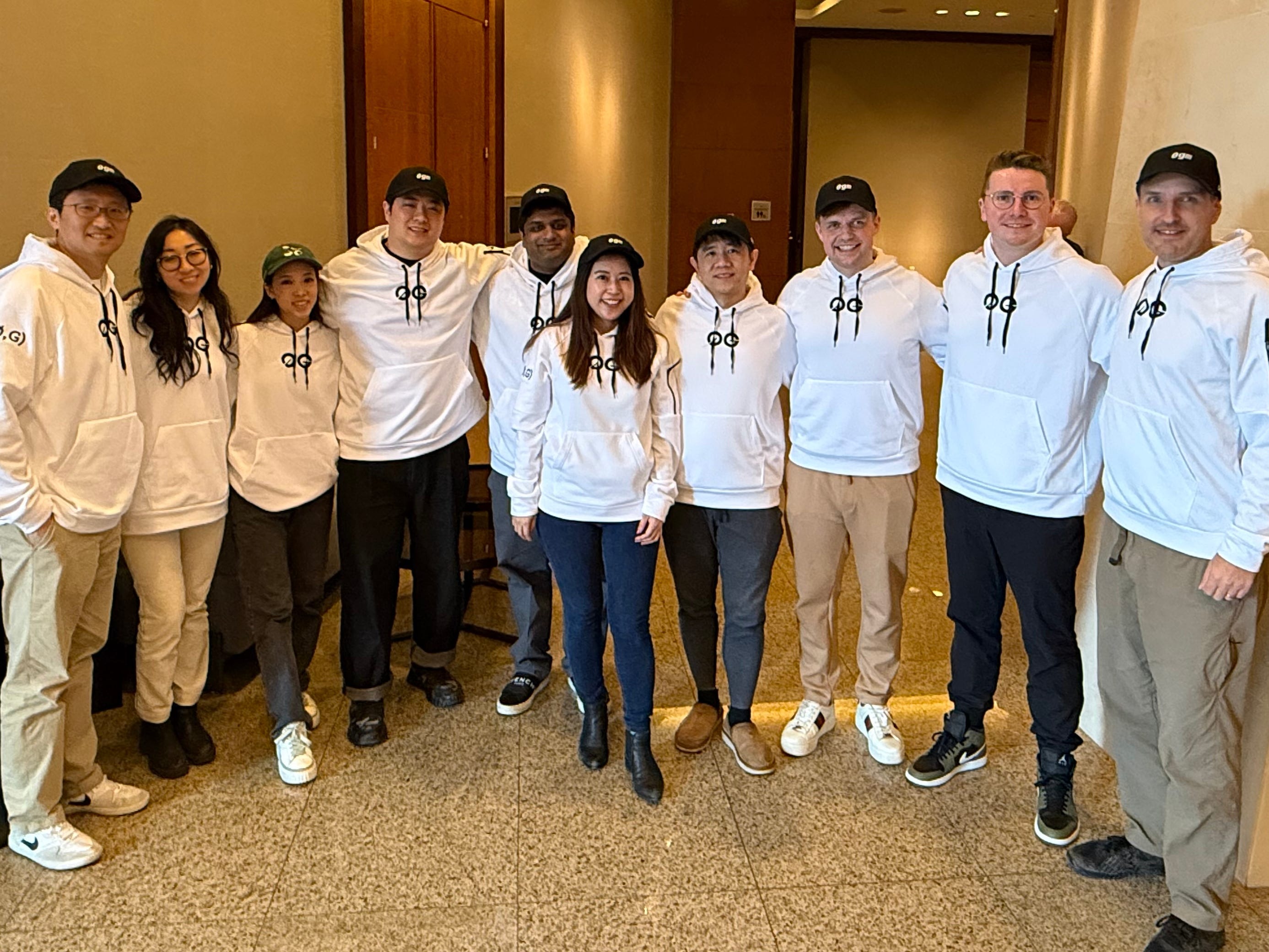 The 0G Labs team, 10 people wearing company hoodies.