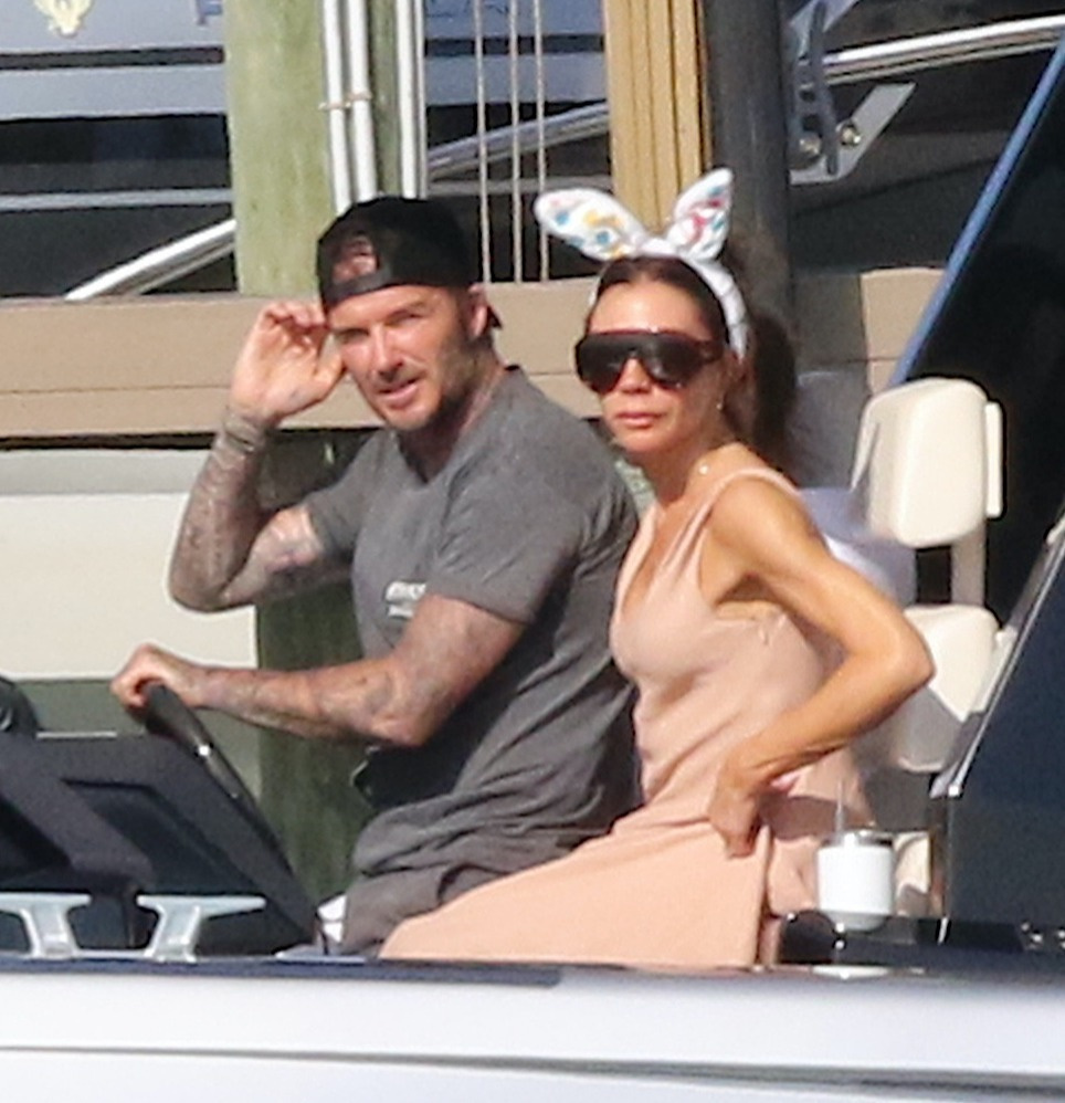 David and Victoria Beckham pictured in their convertible on Easter Sunday.