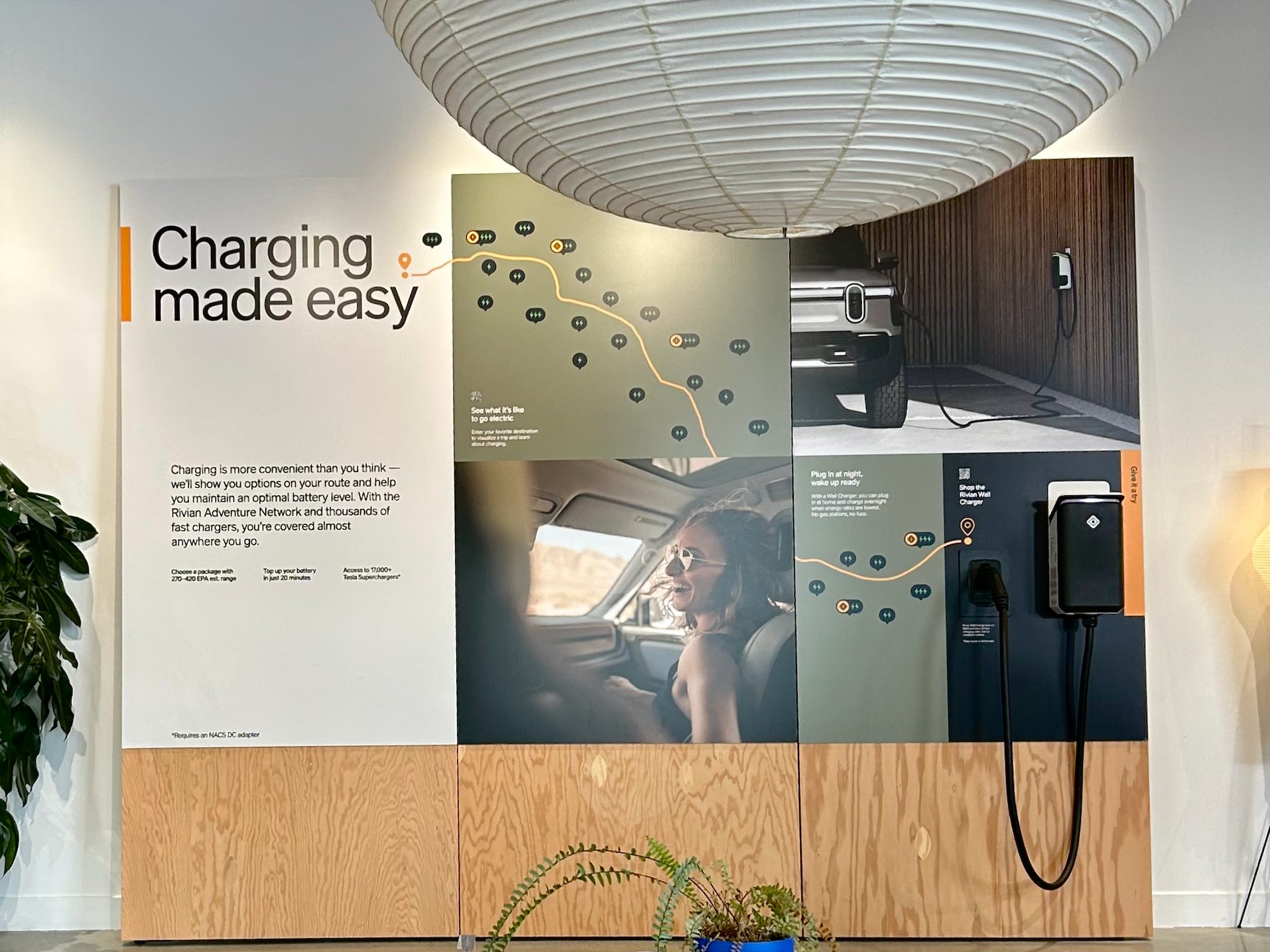 EV information on wall at Rivian showroom in Brooklyn