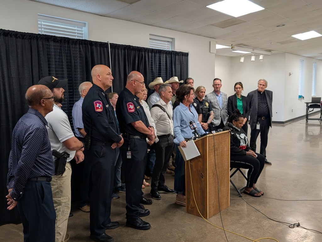 Search and rescue teams at Fireman's Park in Brenham, Texas, after locating the body of 10-year-old Devah Woods who was swept away by floodwaters