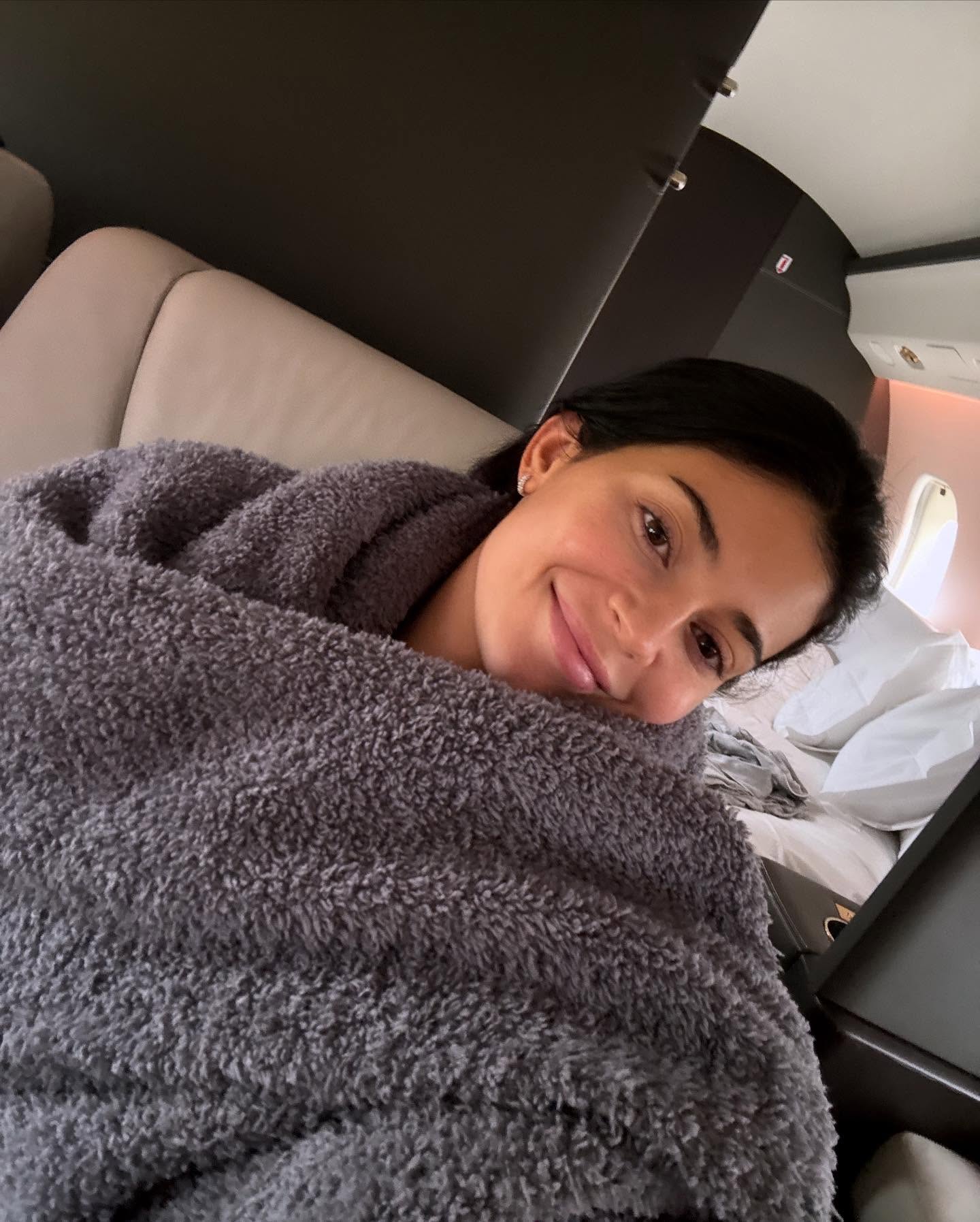 Kylie Jenner goes barefaced while on a private jet.