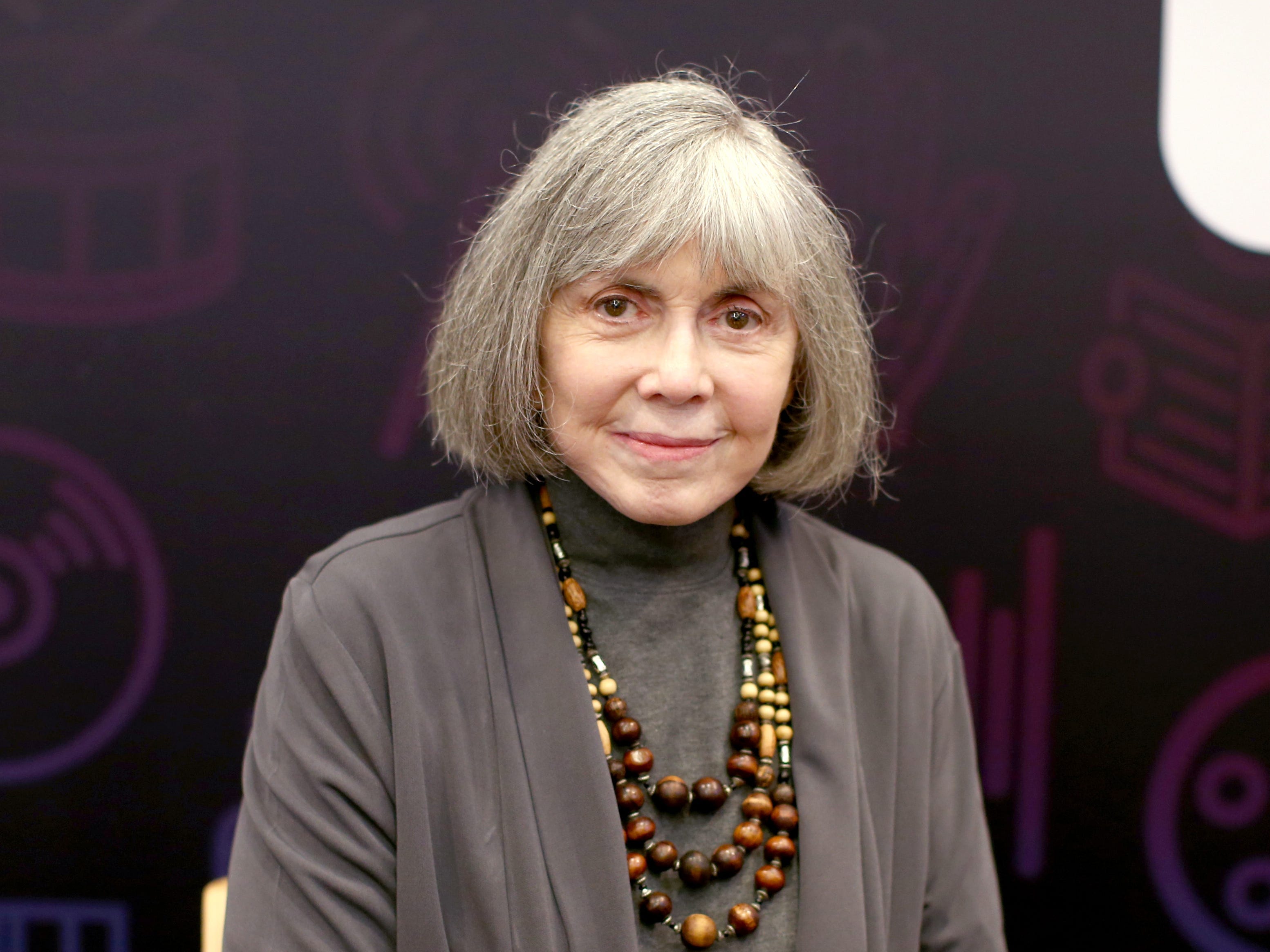 Author Anne Rice signs books during Entertainment Weekly's PopFest at The Reef on October 29, 2016