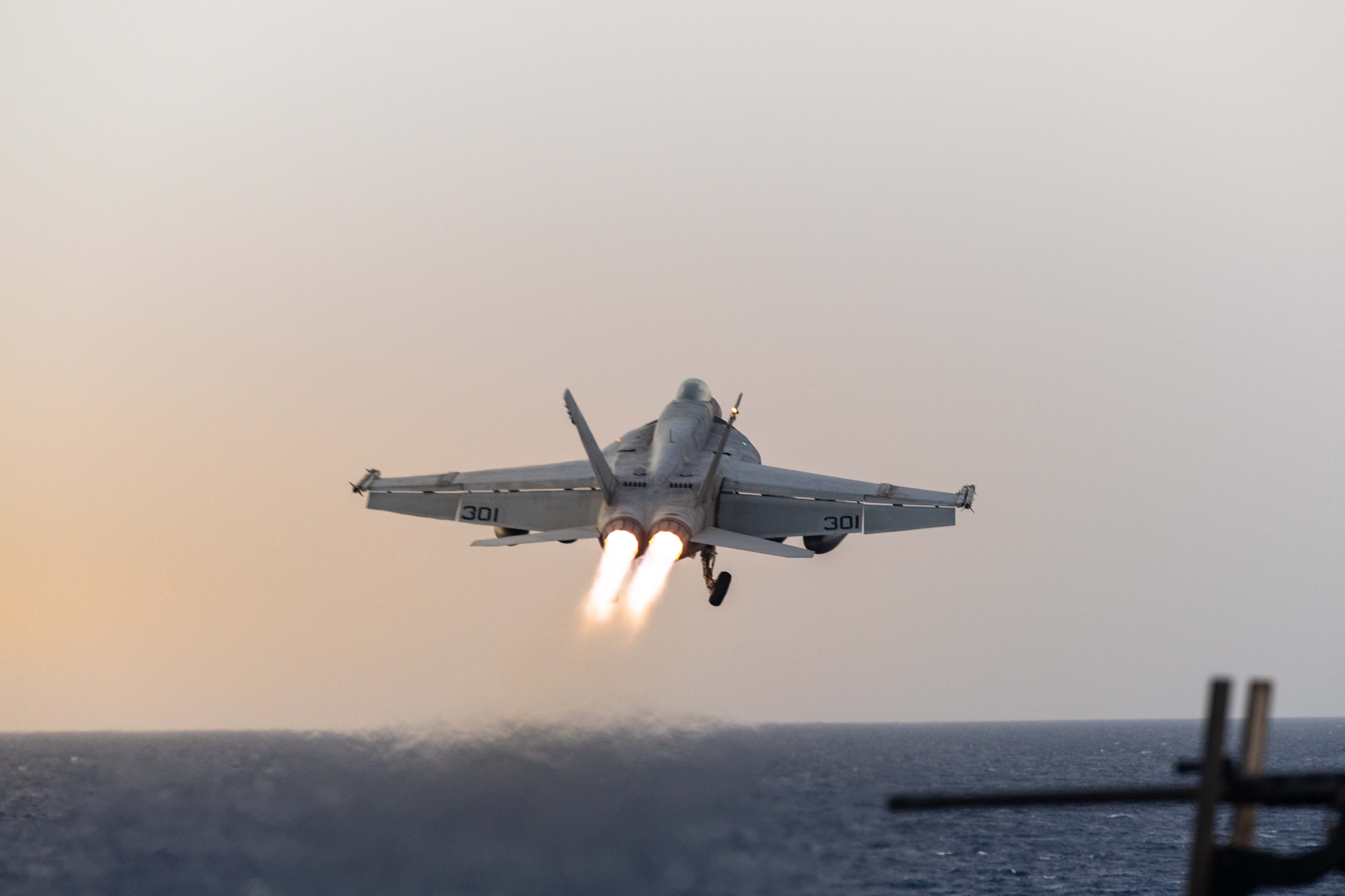 An F/A-18E Super Hornet, attached to Strike Fighter Squadron (VFA) 81, launches from the flight deck of the Nimitz-class aircraft carrier USS Harry S. Truman (CVN 75) during flight operations in the U.S. Central Command area of responsibility.