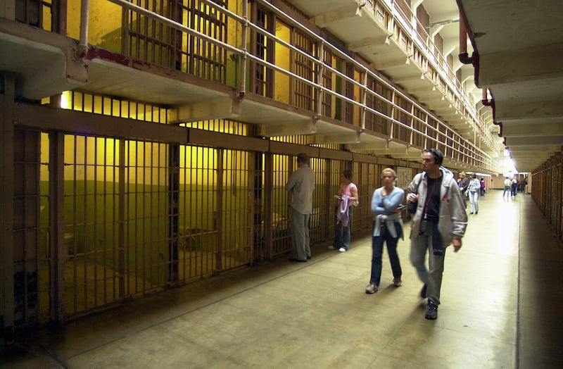 Tourists visit Alcatraz prison in September 2002.